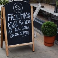 The A-board outside Chalk Coffee is a sign of the times, reminding you that you need to wear a mask (from October 2020).