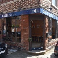 The front of Garden Social Coffee House on the corner of Catherine and Charlotte Streets, the open door showing no favouritism to either!