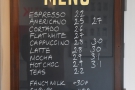 The menus are on the wall behind the counter, led by the concise drinks menu.