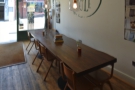 ... while on the opposite side, there's an eight-person communal table.
