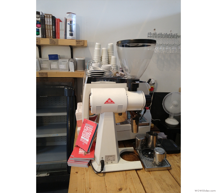 Another view of the EK43 grinder and espresso machine beyond.