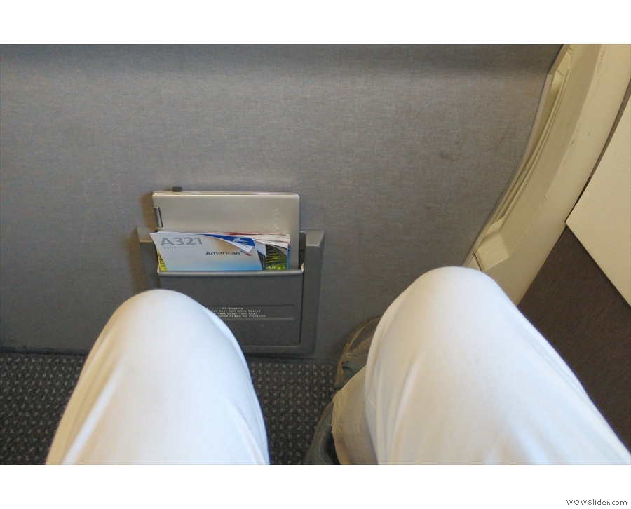 There's plenty of legroom, and I can get my laptop in the magazine pocket.