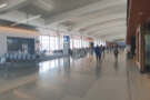 The terminal itself is this long, wide, bright corridor, with gates on one side...