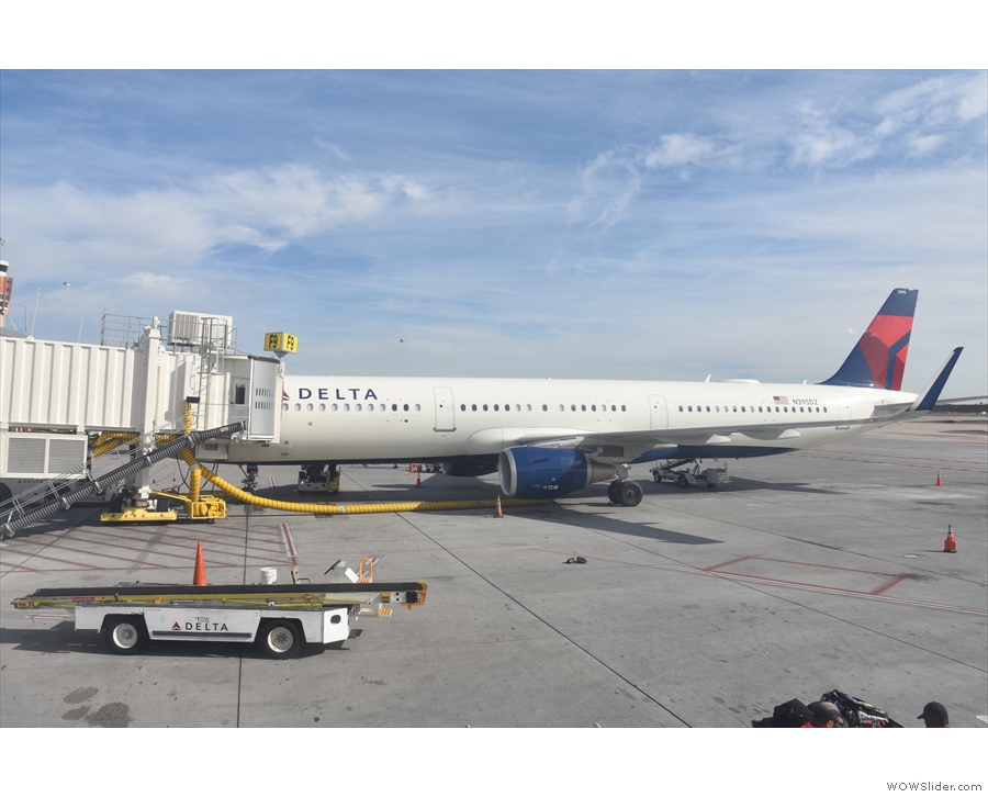 The view out of my window and another Delta A321, on its way to Salt Lake City.