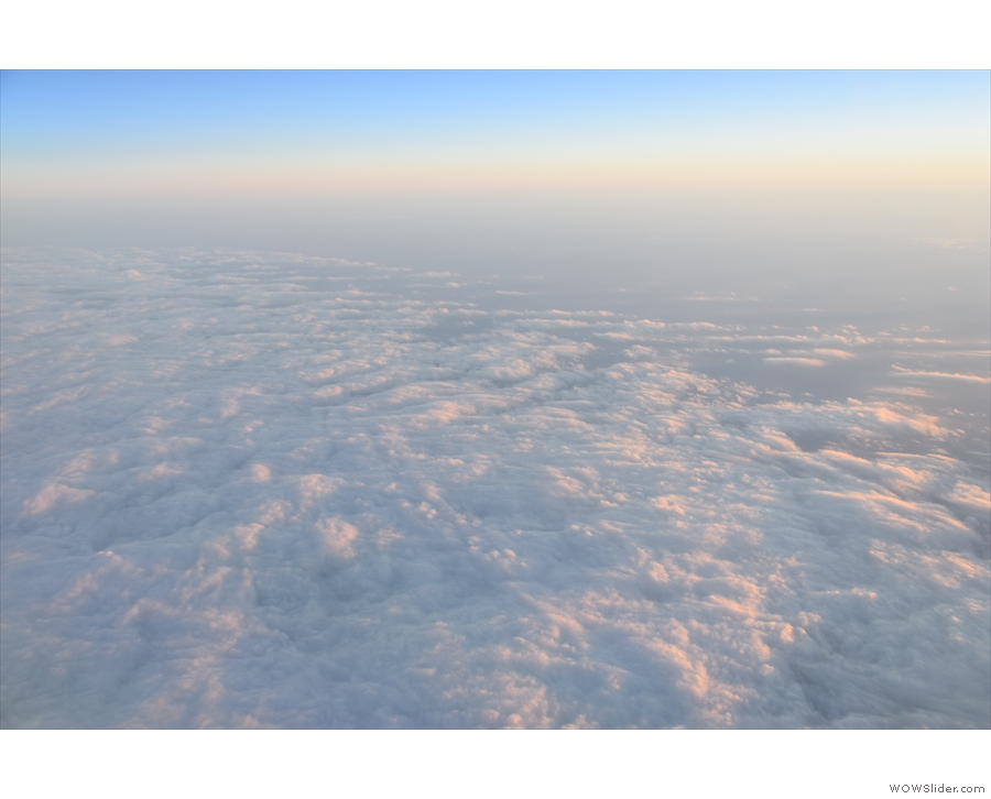 ... we fly over another bank of cloud.
