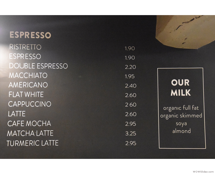 ... with the espresso menu on the wall behind...