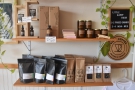 ... beneath which are the retail bags of coffee, including some local roasters...