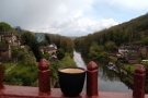 Here's my coffee on the bridge, enjoying the view, looking east, down the river.