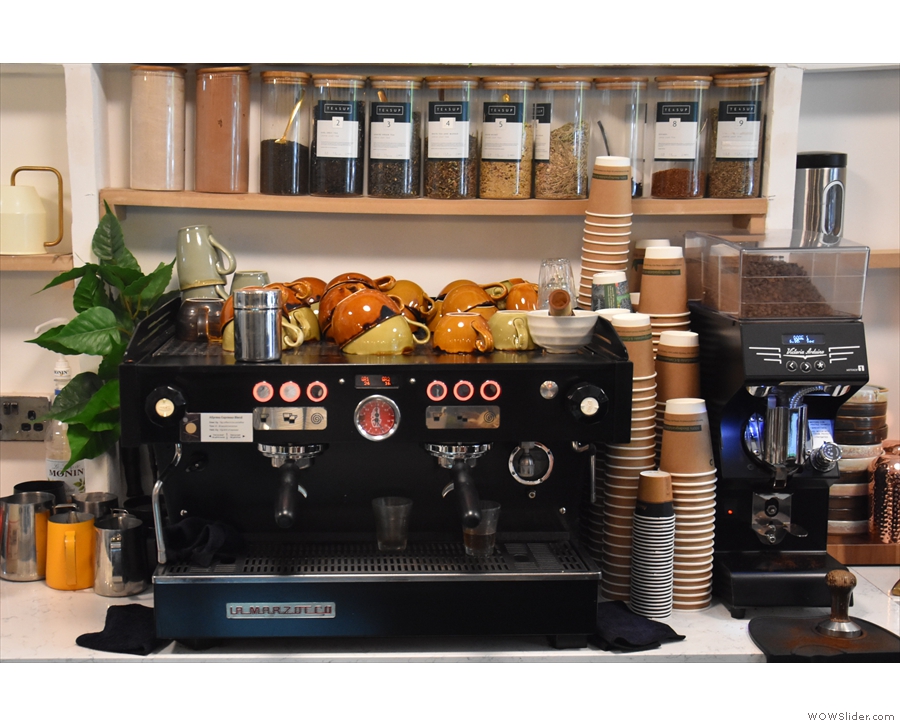 The La Marzocco espresso machine and its Mythos One grinder is at the back...